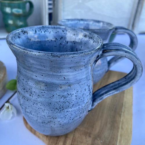 Peppered Frostbite Garcia mugs from Footprint Pottery