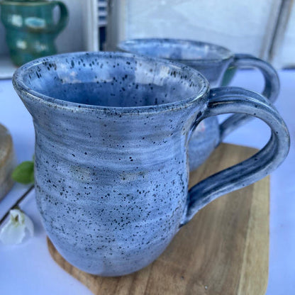 Peppered Frostbite Garcia mugs from Footprint Pottery