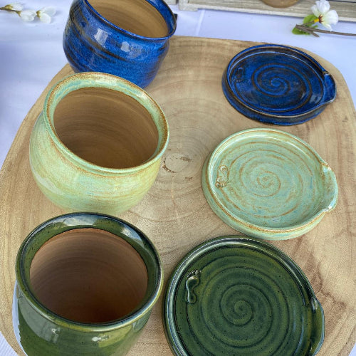 Spoon rests with matching salt pigs. Handmade y Footprint Pottery in Yorkshire